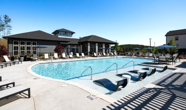 swimming pool with tanning shelf